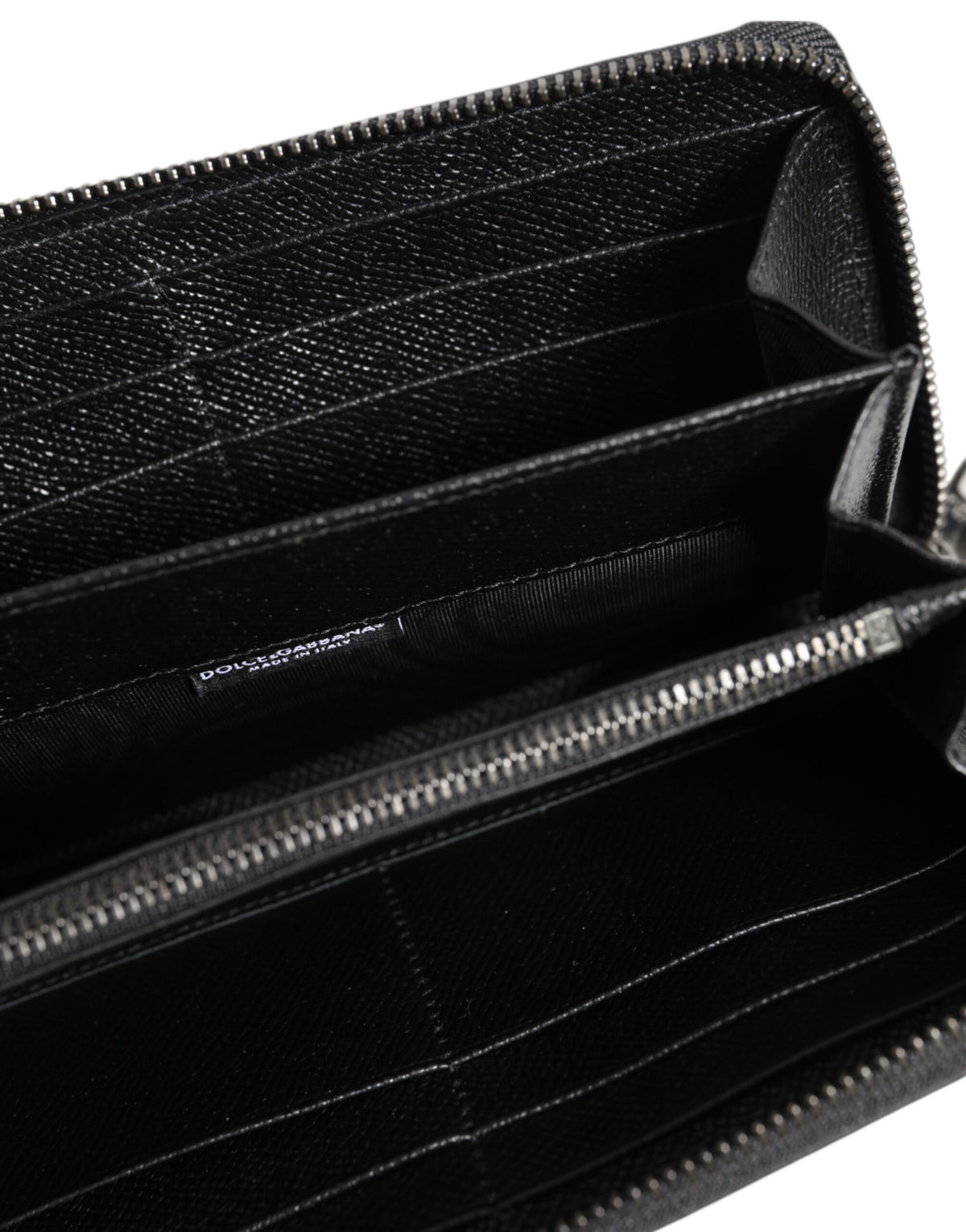 Discover the Dolce & Gabbana Black Leather #DGFAMILY Zipper Continental Wallet, a masterful blend of elegance and functionality crafted from premium leather, perfect for the discerning individual.