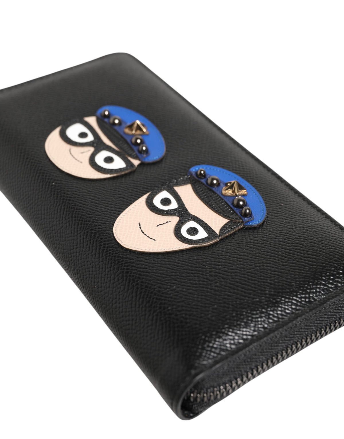 Indulge in the exquisite Dolce & Gabbana Black Leather #DGFAMILY Zipper Continental Wallet, a timeless blend of luxury and sophistication crafted from premium leather, perfect for the discerning individual.