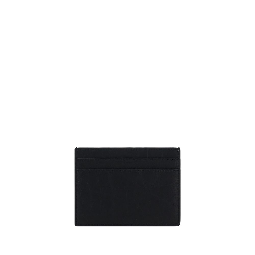 Discover the Saint Laurent Black Lamb Ovis Aries Wallet, a masterpiece of exquisite craftsmanship and timeless elegance, perfect for the discerning individual.