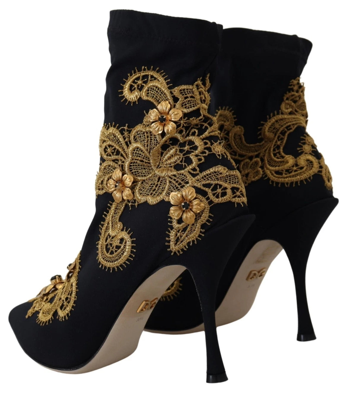 Experience the exquisite craftsmanship of Dolce & Gabbana's Black Gold Embroidery Crystal Boots, where luxurious materials and timeless elegance redefine your style narrative.