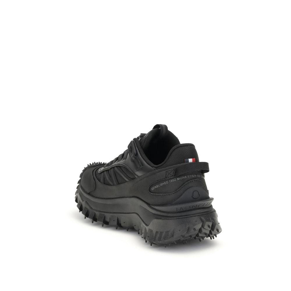 Indulge in the exquisite Moncler Black Calf Leather Bos Taurus Athletic Sneakers, where luxurious materials meet unparalleled craftsmanship for the discerning individual.