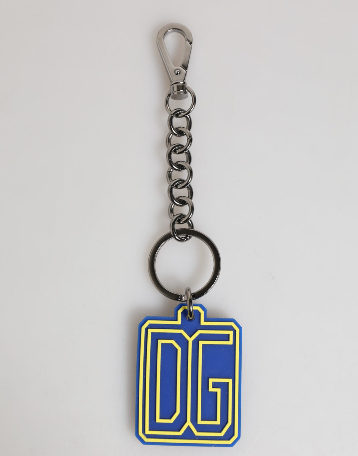 Elevate your style with the Dolce & Gabbana Blue Yellow DG Rubber Logo Silver Keychain, a luxurious blend of artistry and sophistication crafted in Italy.