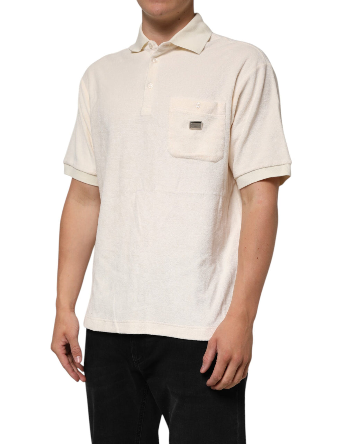 Discover the Dolce & Gabbana Ivory Cotton Terry Logo Pocket Polo T-shirt, a testament to Italian craftsmanship that embodies luxurious comfort and timeless elegance.