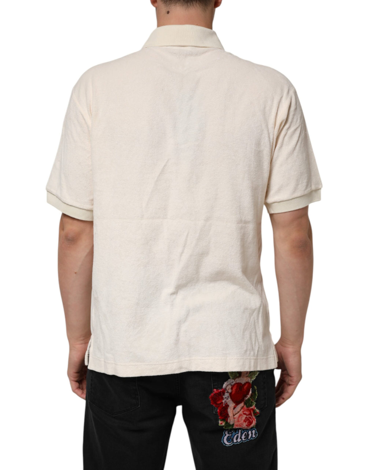 Discover the Dolce & Gabbana Ivory Cotton Terry Logo Pocket Polo T-shirt, a testament to Italian craftsmanship and luxurious comfort, perfect for the discerning individual.