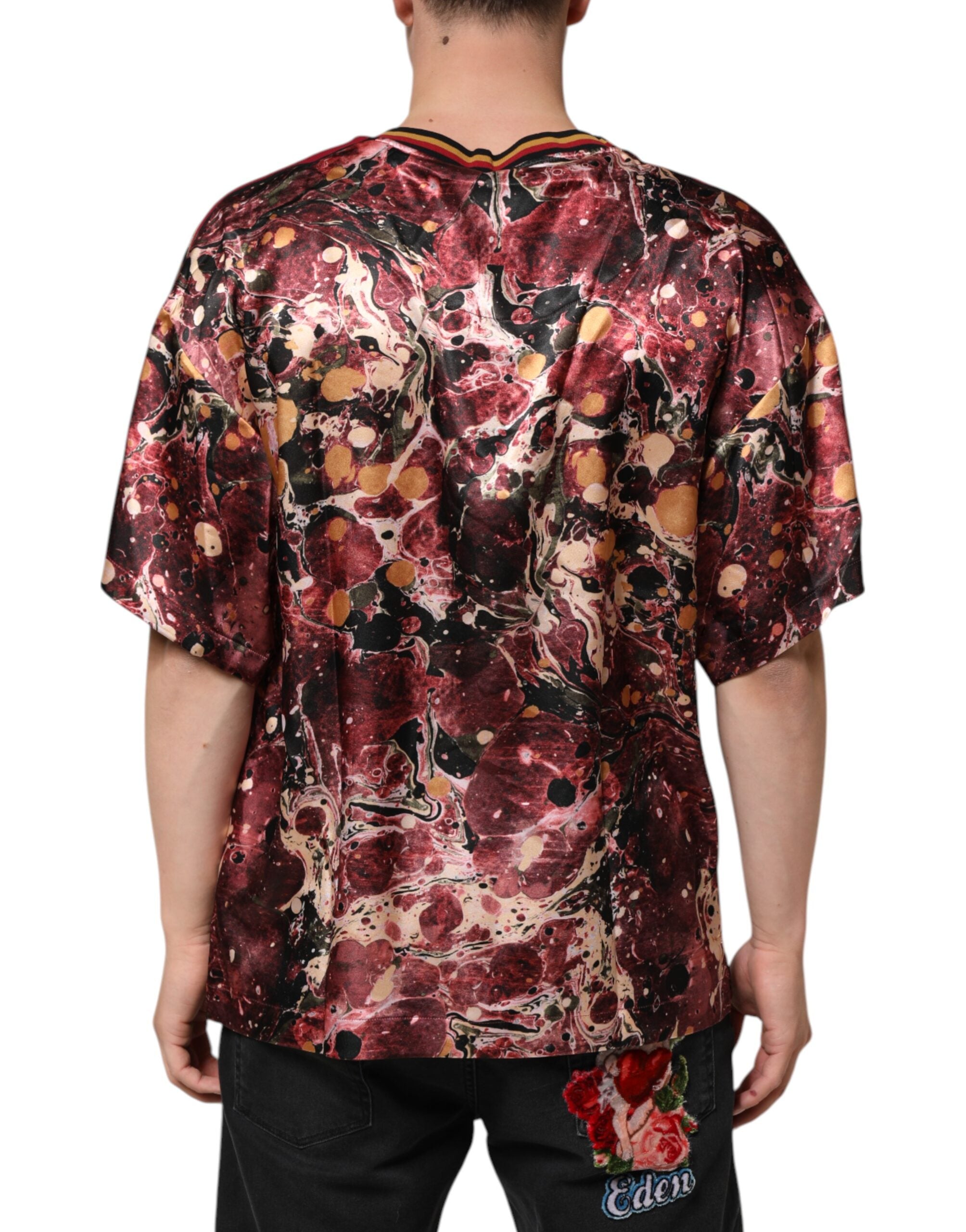 Elevate your wardrobe with the Dolce & Gabbana Multicolor Polyester Marble Print Oversize T-shirt, a masterpiece of artistry and luxury, crafted in Italy for the discerning individual.