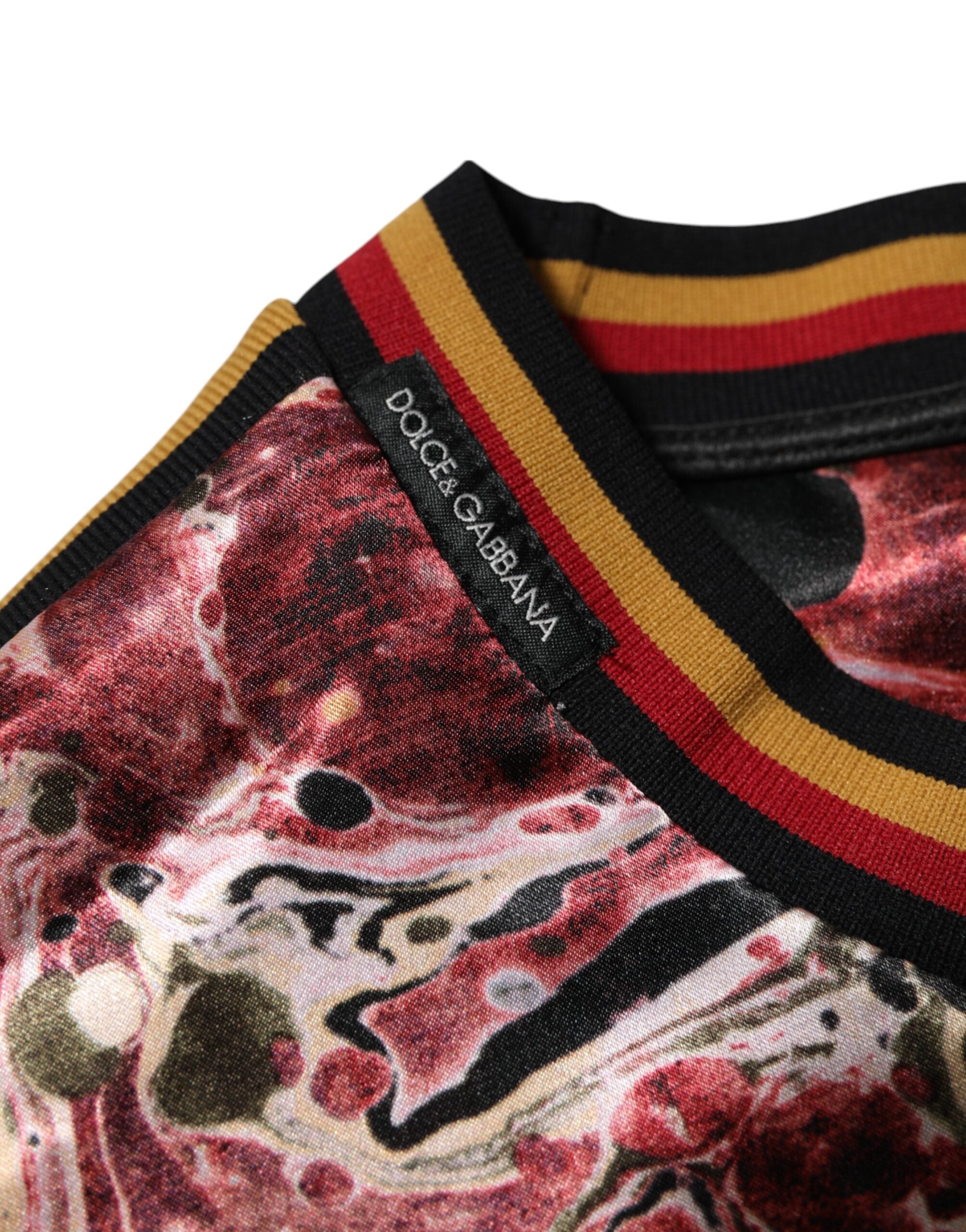 Elevate your style with the Dolce & Gabbana Multicolor Polyester Marble Print Oversize T-shirt, a masterpiece of luxurious artistry crafted in Italy, perfect for making a bold statement.