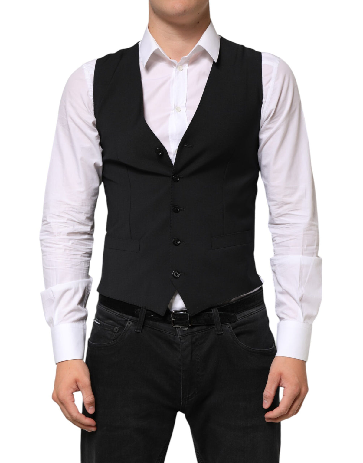 Discover the Dolce & Gabbana Black Wool Dress Waistcoat Vest, a masterpiece of Italian craftsmanship, blending elegance and comfort for the discerning individual.
