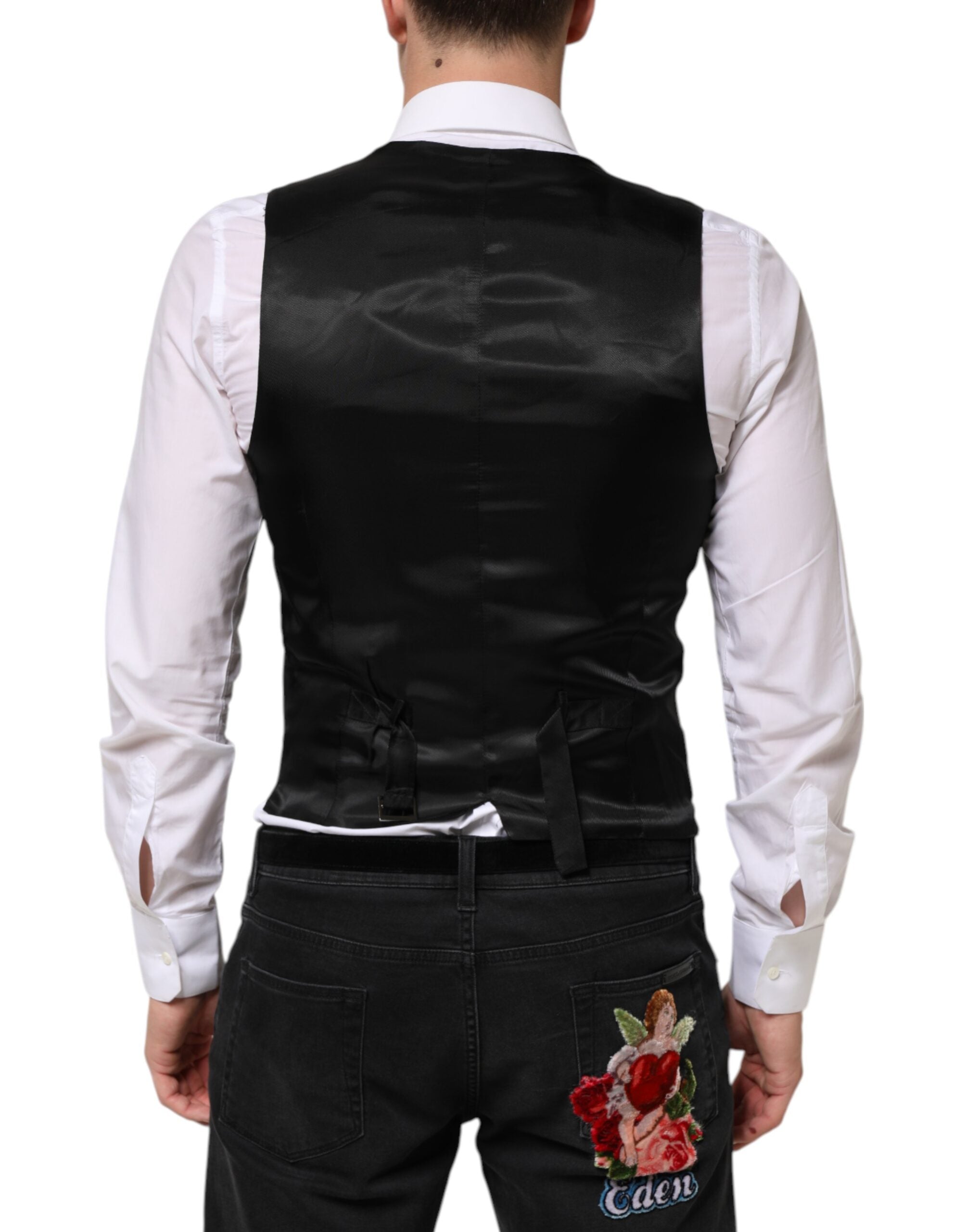 Discover the exquisite Dolce & Gabbana Black Wool Dress Waistcoat Vest, a timeless piece crafted in Italy from premium materials, embodying luxury and sophistication for the discerning individual.