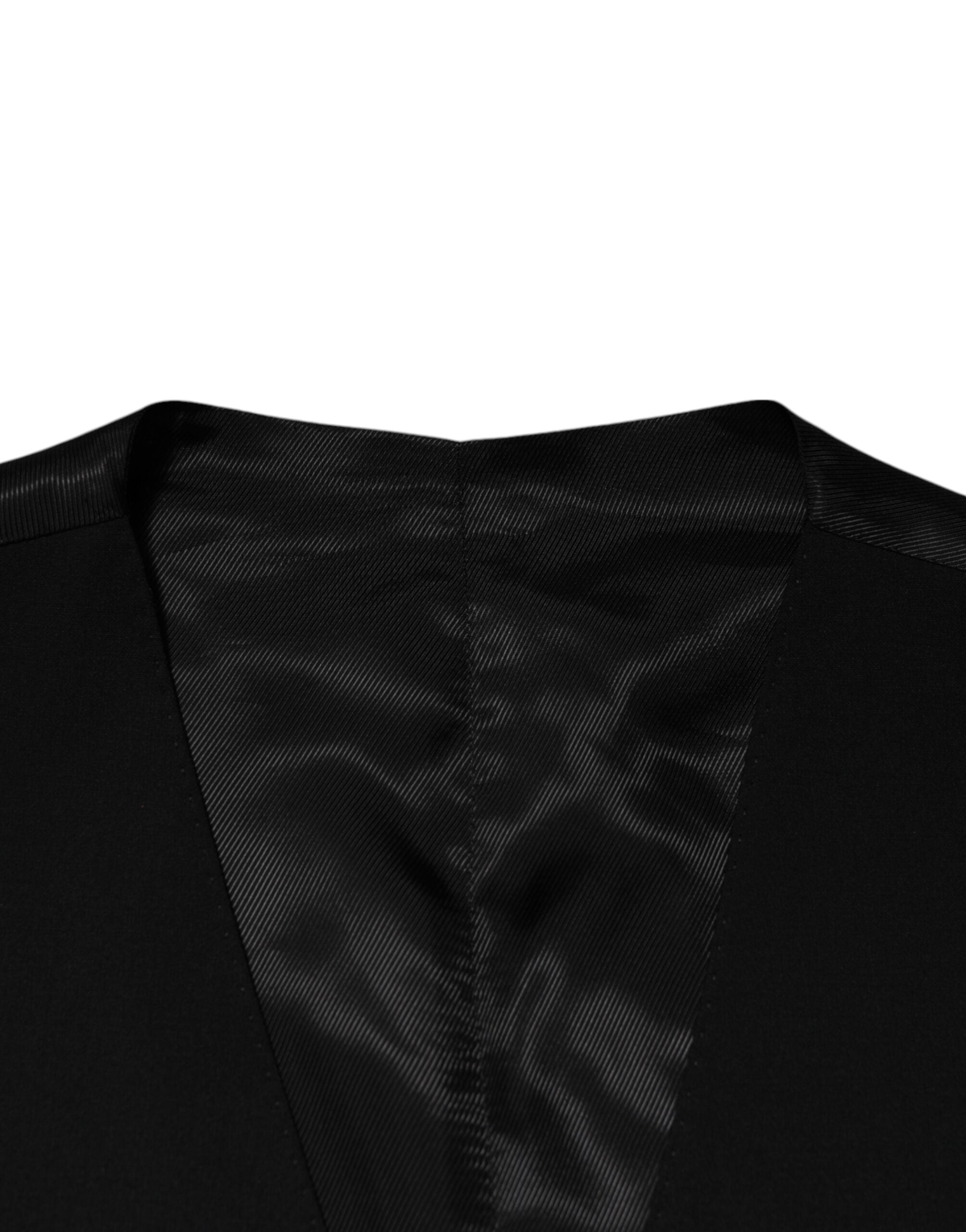 Indulge in the exquisite Dolce & Gabbana Black Wool Dress Waistcoat Vest, crafted in Italy from premium materials, embodying timeless elegance and sophisticated allure.