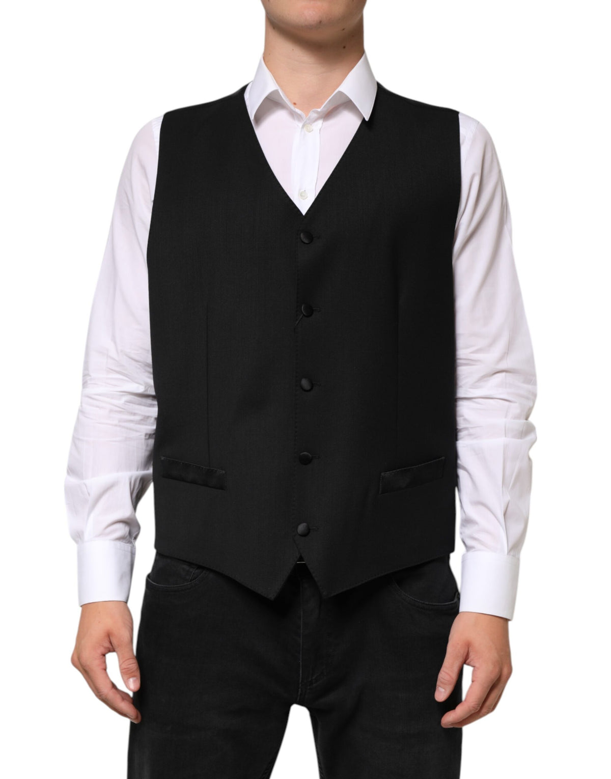 Discover the Dolce & Gabbana Black Wool Dress Formal Waistcoat Vest, a masterpiece of Italian craftsmanship, blending luxurious wool and silk for timeless elegance.