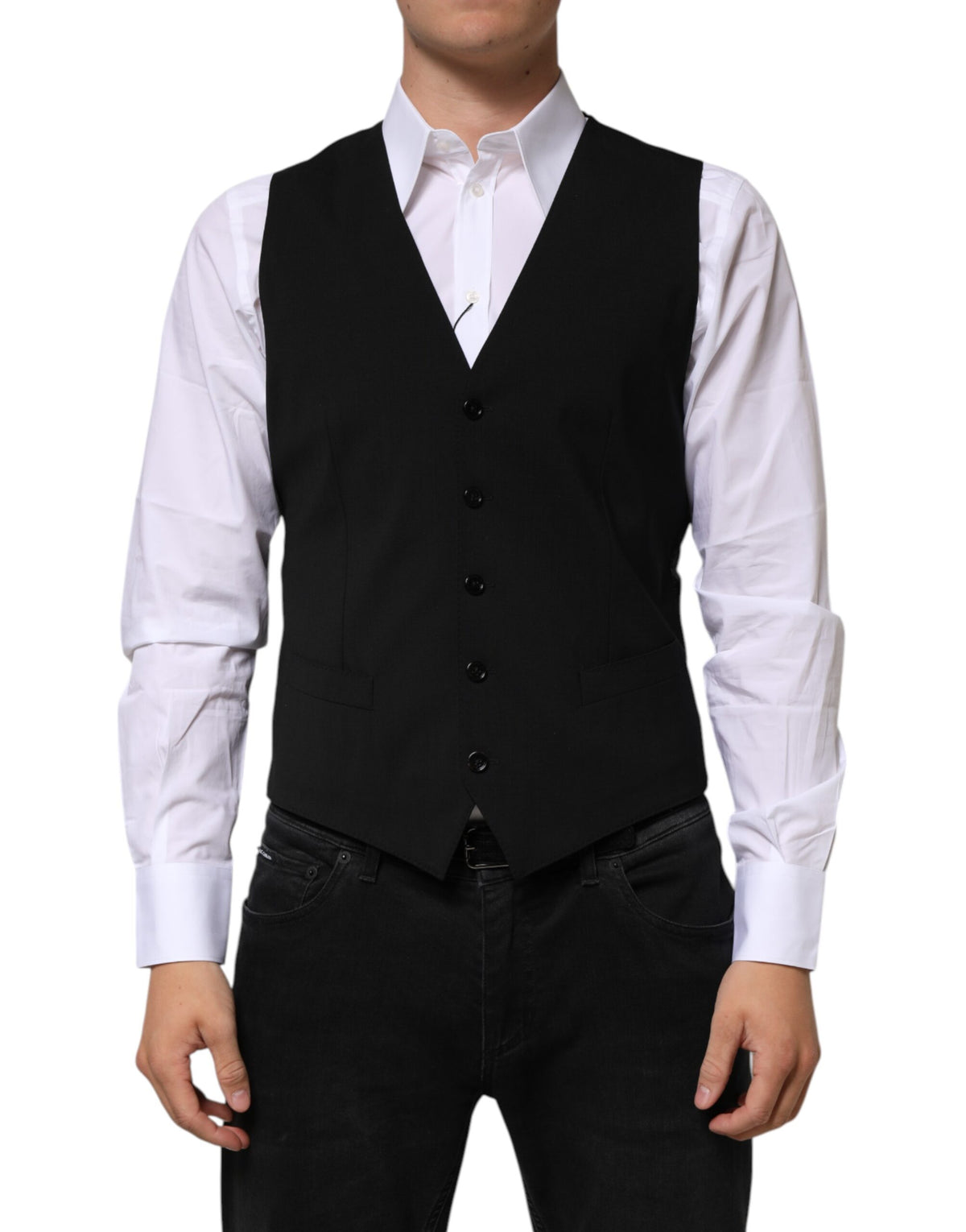 Elevate your formal attire with the Dolce & Gabbana Black Wool Dress Waistcoat Vest, a masterpiece of Italian craftsmanship in luxurious virgin wool, designed for timeless sophistication.