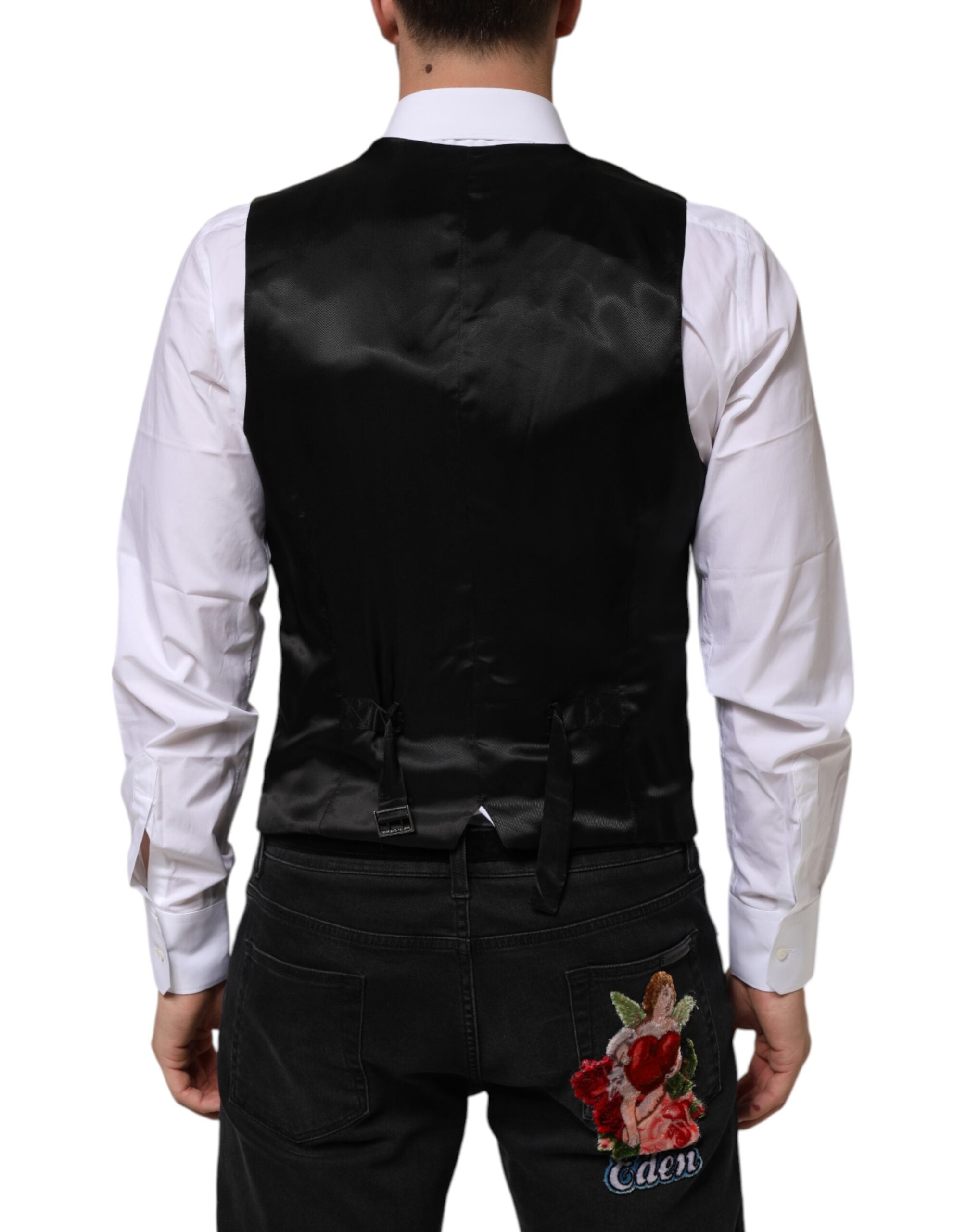 Experience the allure of Dolce & Gabbana's Black Wool Dress Waistcoat Vest, crafted from luxurious virgin wool, embodying timeless elegance and refined sophistication for every occasion.
