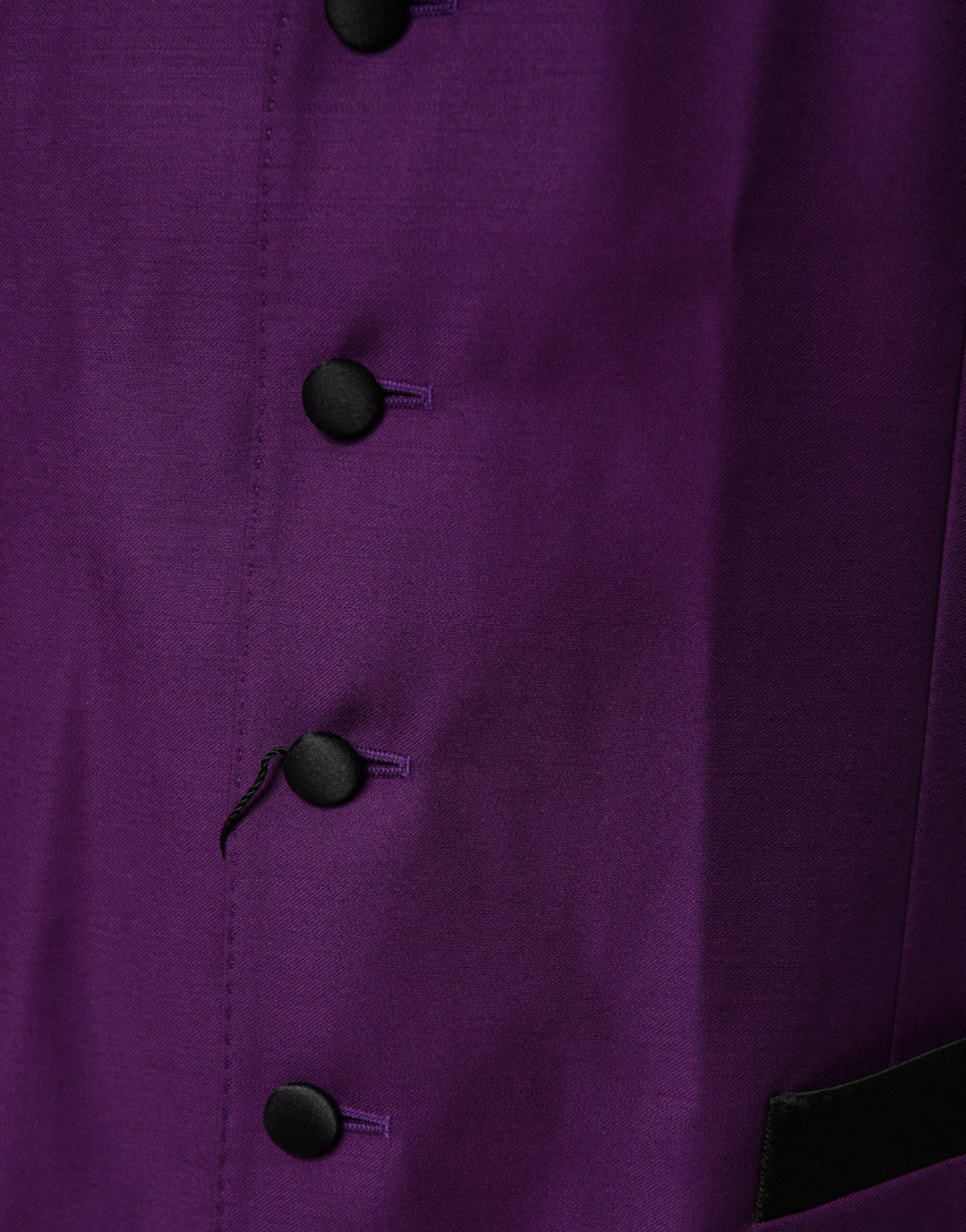 Elevate your formal wardrobe with the Dolce & Gabbana Purple Wool Dress Waistcoat Vest, a luxurious blend of virgin wool and silk, embodying Italian craftsmanship and timeless elegance.