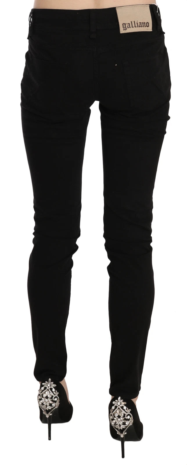Indulge in the exquisite craftsmanship of John Galliano's Black Mid Waist Slim Fit Skinny Jeans, where luxurious design meets effortless elegance, perfect for any occasion.