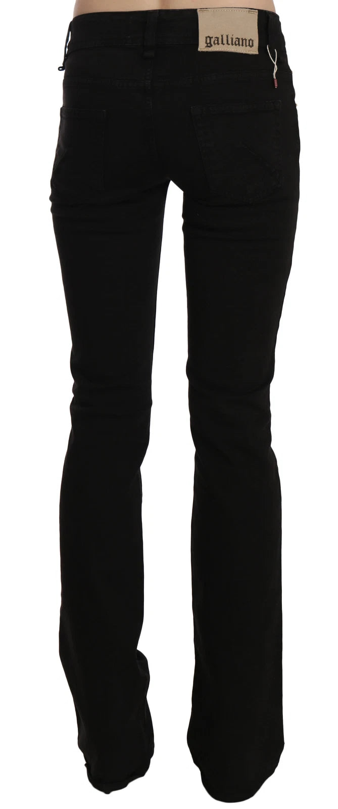Indulge in the exquisite allure of John Galliano's Black Low Waist Slim Leg Skinny Denim, meticulously crafted in Italy for the discerning individual who embodies luxury and confidence.