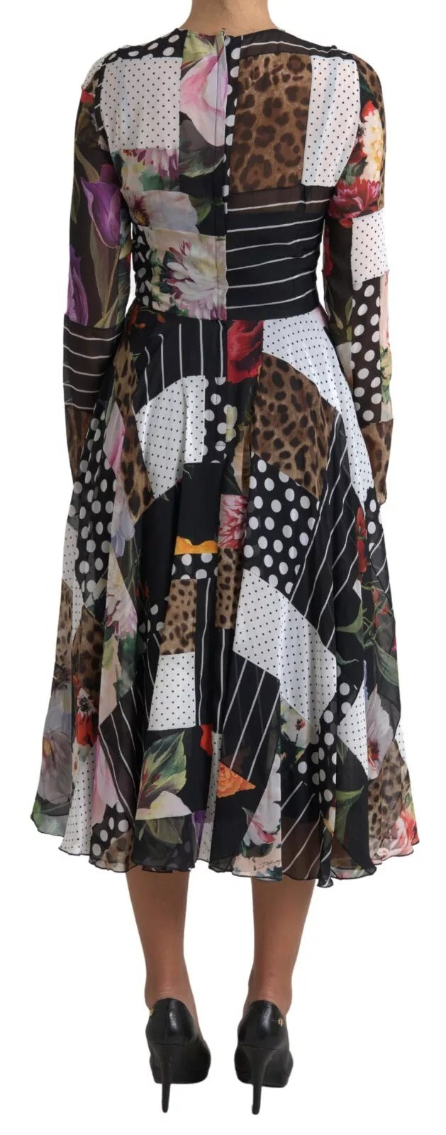 Indulge in the exquisite Dolce & Gabbana Multicolor Patchwork Floral Leopard Dress, a luxurious blend of silk and elastane, embodying Italian craftsmanship and timeless elegance.