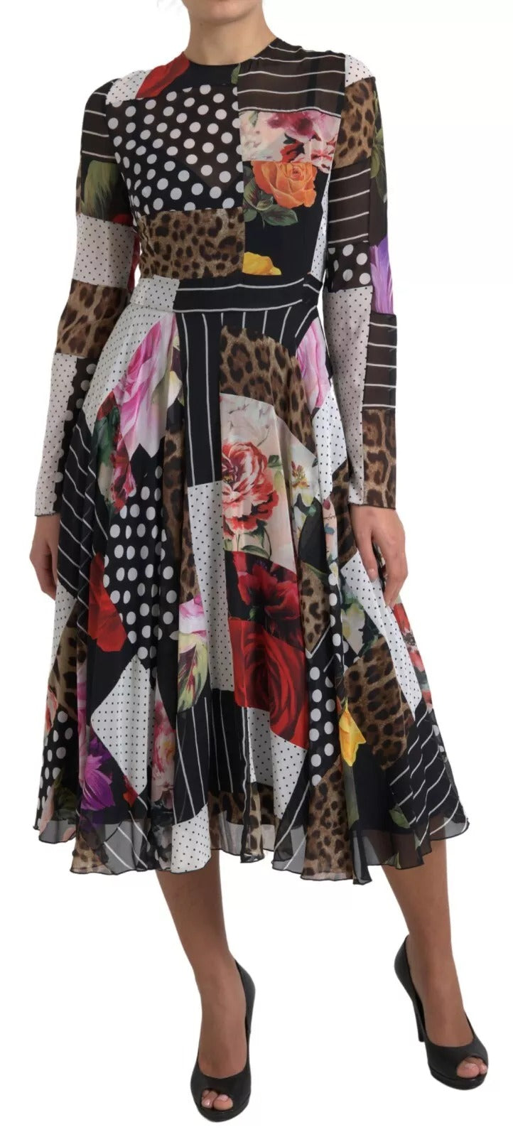Indulge in the exquisite artistry of the Dolce & Gabbana Multicolor Patchwork Floral Leopard Dress, a luxurious silk blend that redefines elegance and sophistication.