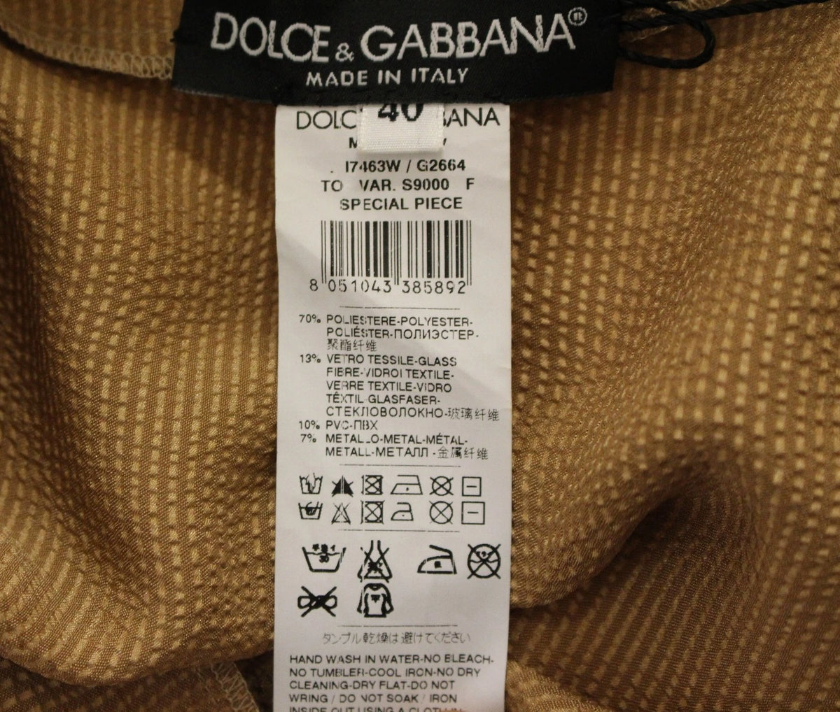 Indulge in the exquisite Dolce & Gabbana Gold SPECIAL Piece Runway Crystal Blouse, a masterpiece of Italian craftsmanship adorned with crystals and pearls, embodying timeless luxury.