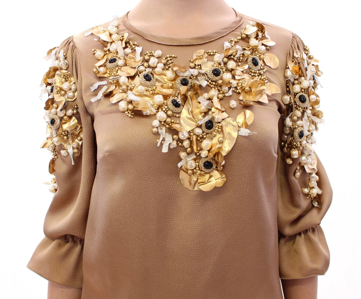 Indulge in the exquisite Dolce & Gabbana Gold SPECIAL Piece Runway Crystal Blouse, a masterpiece of haute couture elegance, crafted with luxurious materials and timeless allure.