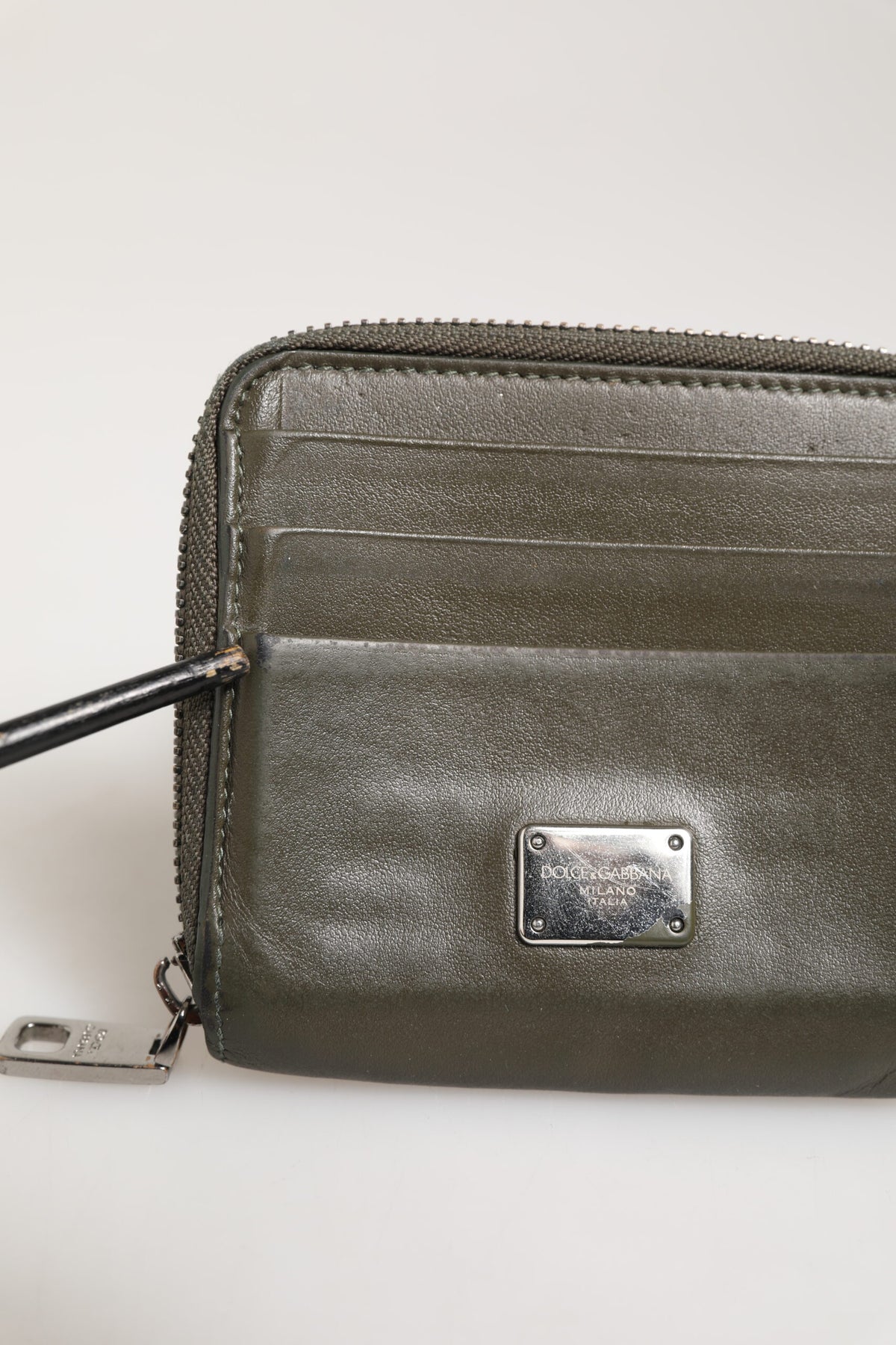 Elevate your style with the Dolce & Gabbana Military Green Leather Card Holder, a symbol of artisanal elegance and timeless luxury, crafted from premium calf leather.