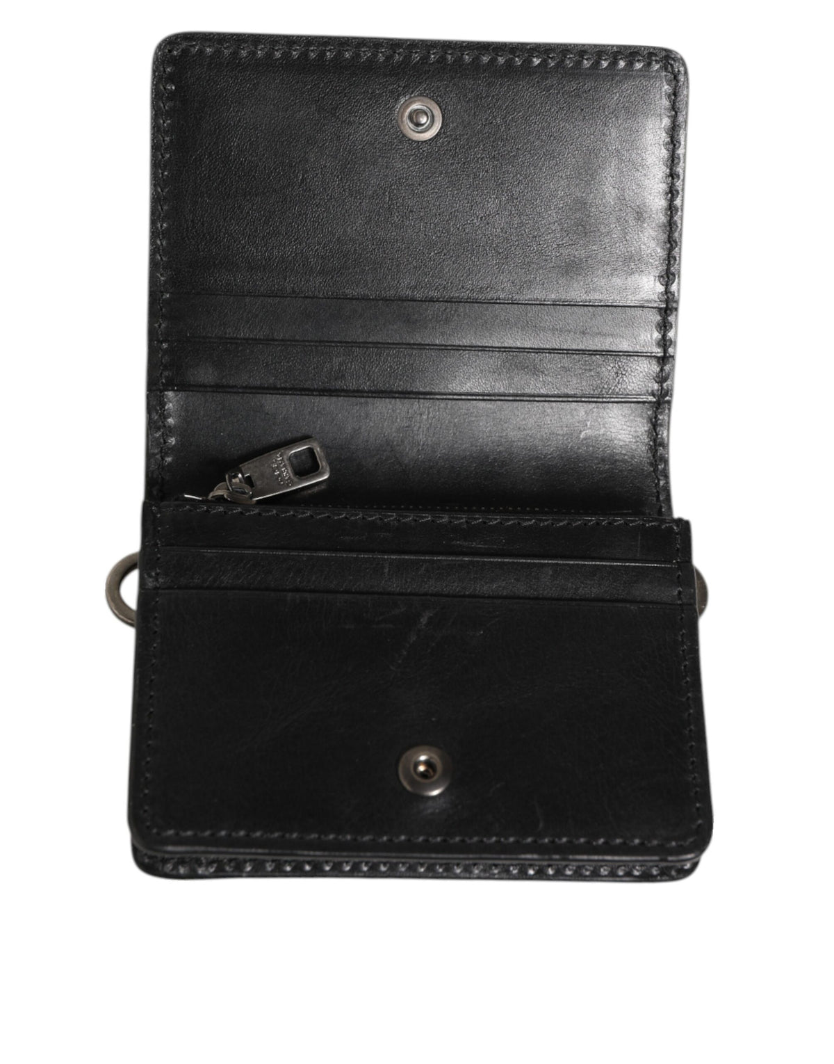 Elevate your style with the Dolce & Gabbana Black Leather Bifold Card Holder, a testament to Italian craftsmanship and timeless elegance, perfect for the discerning individual.