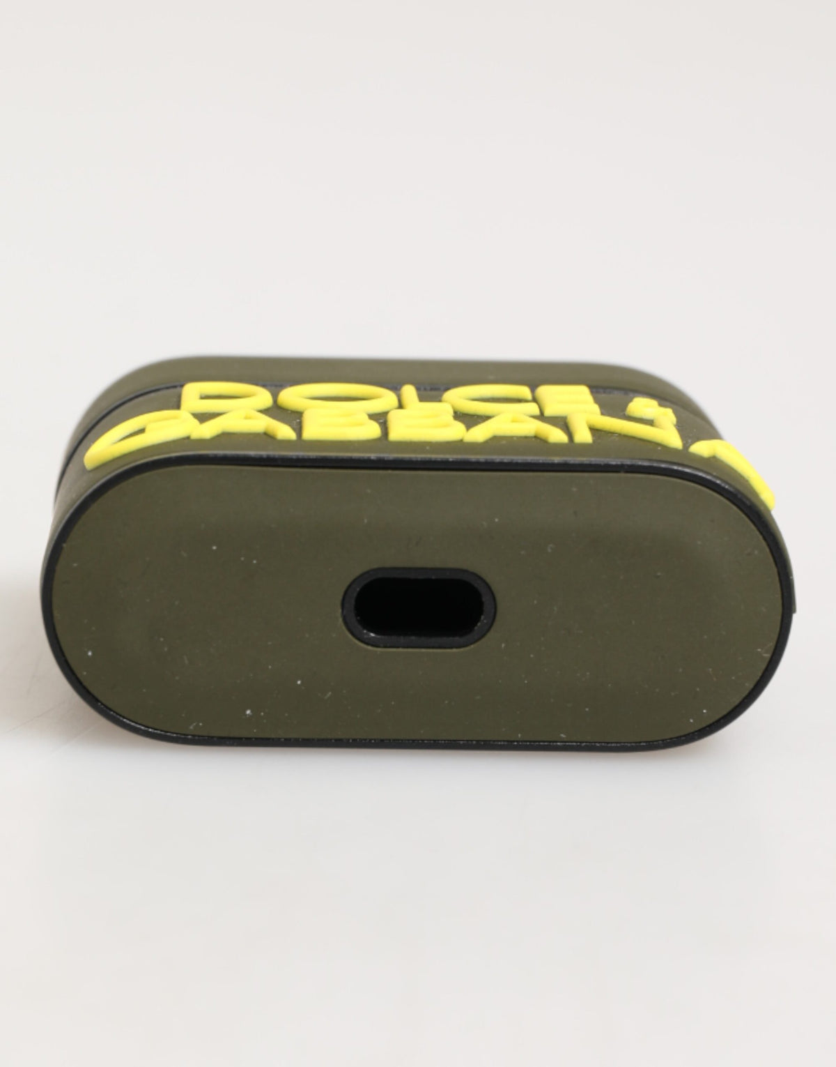 Elevate your style with the Dolce & Gabbana Army Green Rubber Logo Embossed Airpods Case, a luxurious blend of craftsmanship and sophistication, perfect for the discerning individual.
