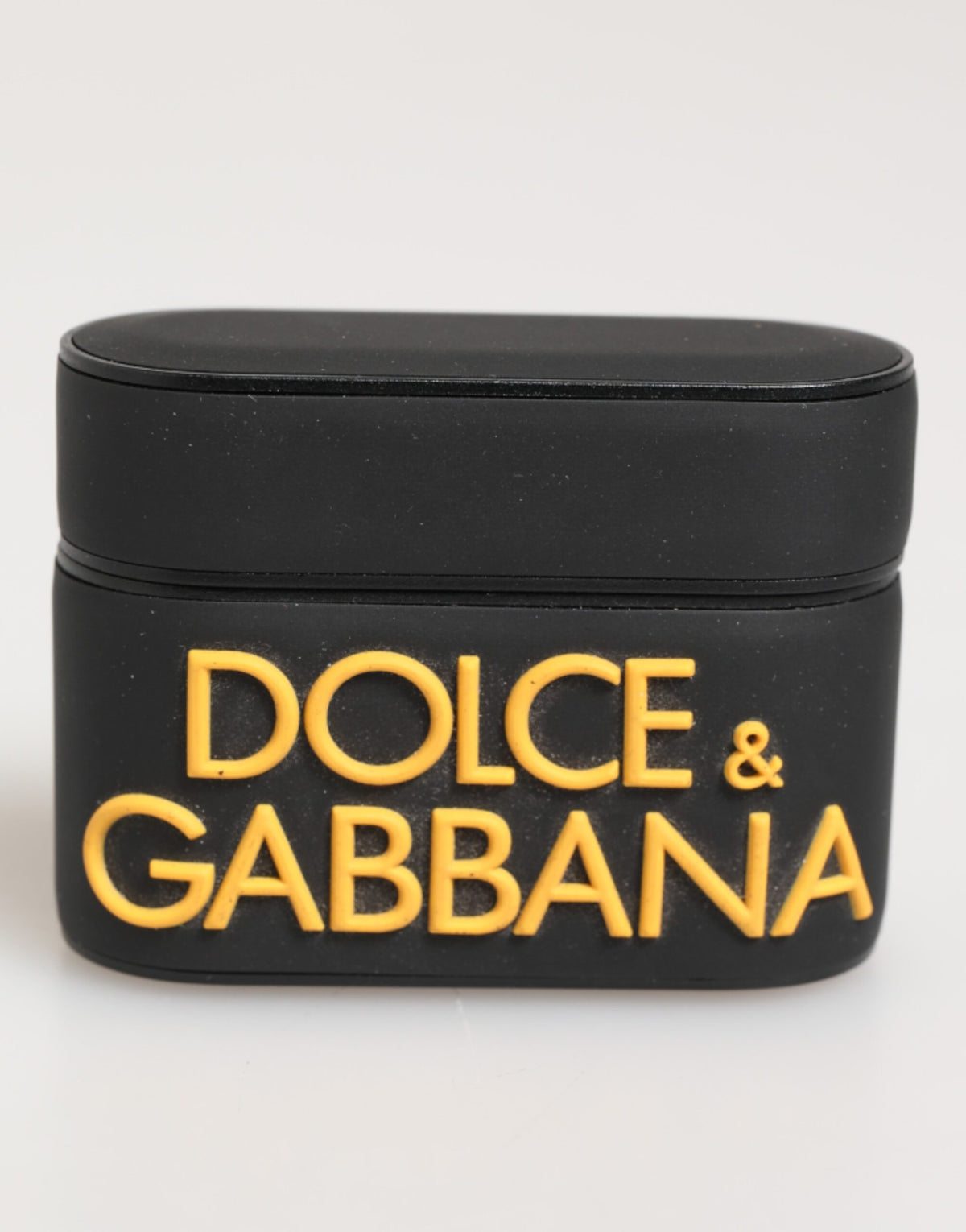Indulge in the luxurious Dolce & Gabbana Black Yellow Rubber Logo Embossed Accessory Airpods Case, where exquisite craftsmanship meets bold design, elevating your style effortlessly.