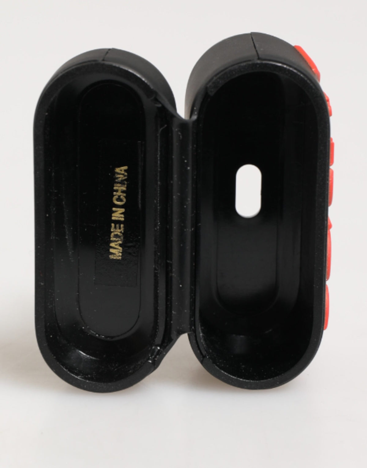 Elevate your style with the Dolce & Gabbana Black Orange Rubber Airpods Case, a fusion of exquisite craftsmanship and bold design, embodying luxury and sophistication.