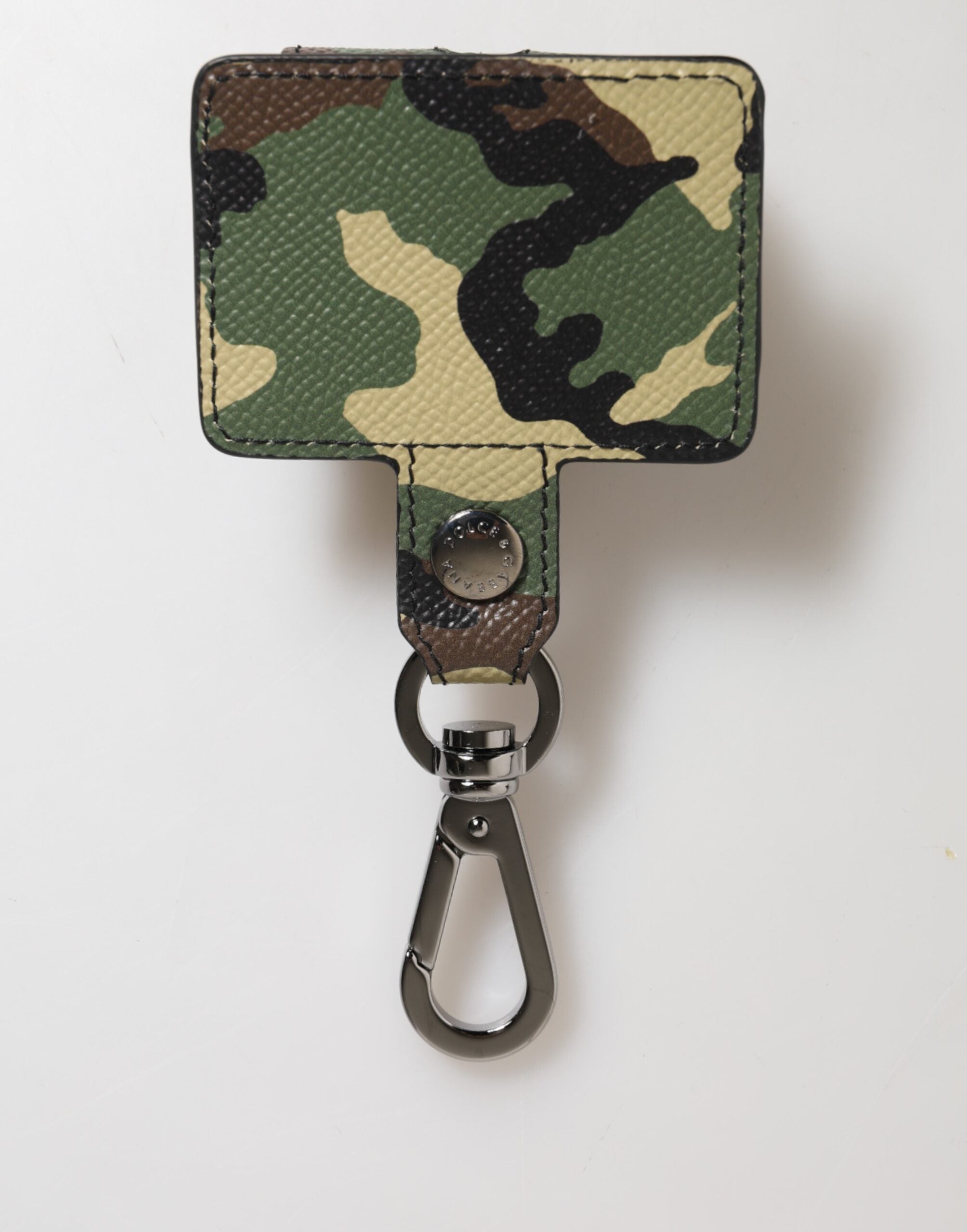 Indulge in the exquisite Dolce & Gabbana Multicolor Camouflage Leather Airpods Case, a luxurious blend of artistry and style, perfect for the discerning individual.