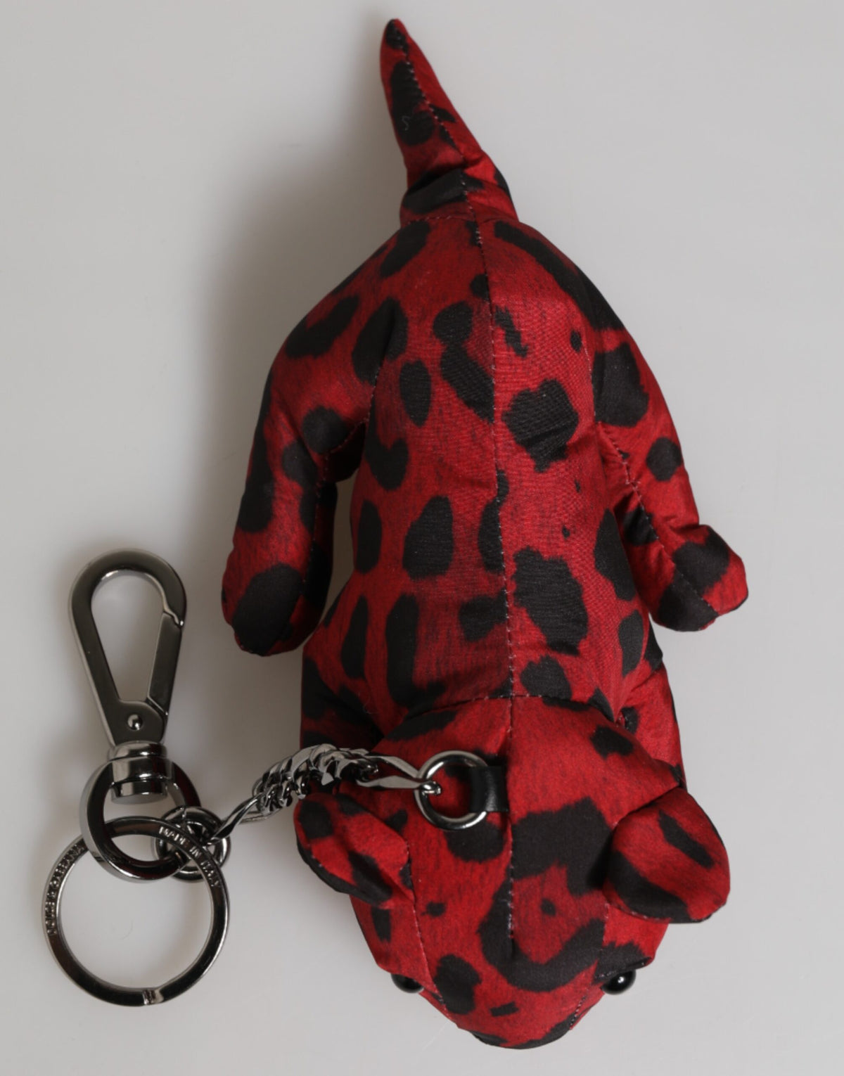 Elevate your style with the Dolce & Gabbana Red Black Animal Silhouette Keychain, a luxurious blend of exquisite craftsmanship and iconic design, perfect for discerning tastes.