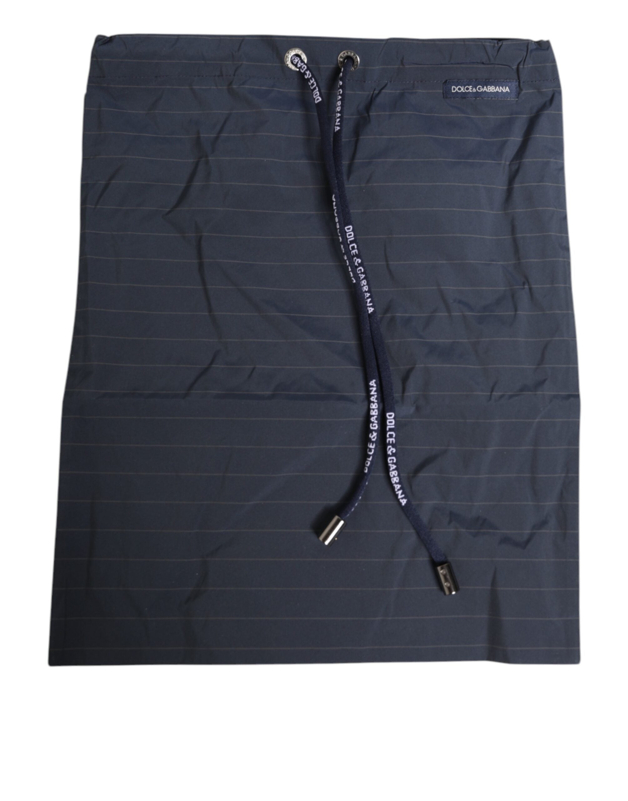 Discover the elegance of Dolce & Gabbana's Navy Blue Pinstripe Swimwear, crafted from premium materials for a luxurious fit that embodies sophistication and timeless style.