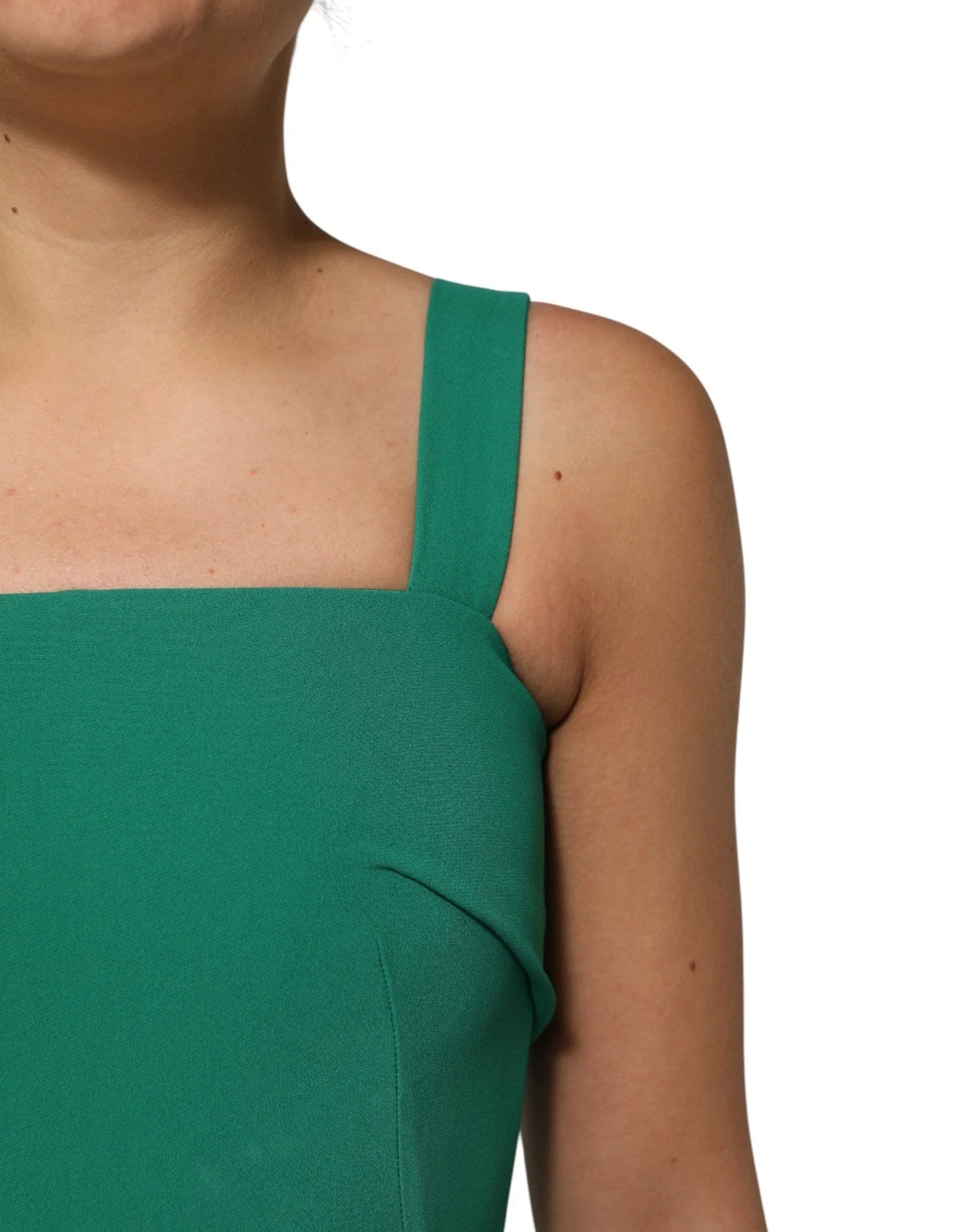 Experience the exquisite allure of the Dolce & Gabbana Dark Green Sleeveless Rayon Bodycon Dress, where luxurious craftsmanship meets timeless elegance, perfect for every sophisticated occasion.