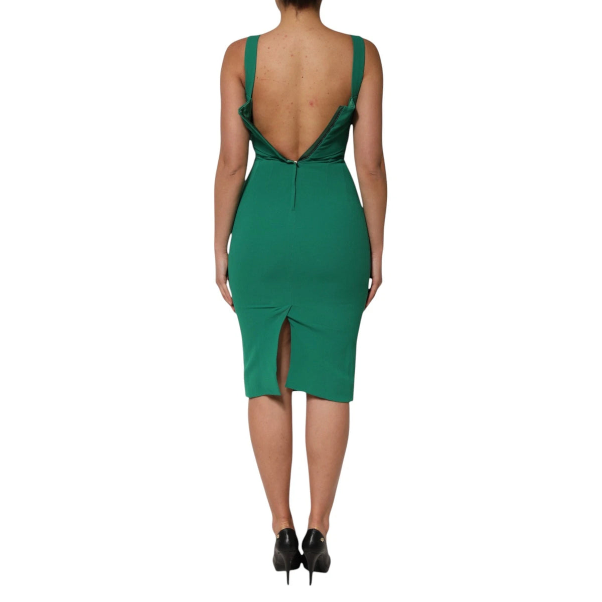 Indulge in the exquisite Dolce & Gabbana Dark Green Sleeveless Rayon Bodycon Dress, a luxurious blend of elegance and sensuality, perfect for any sophisticated occasion.