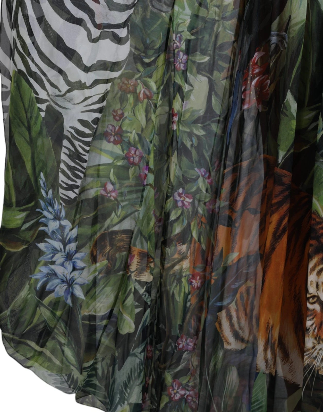 Indulge in the exquisite Dolce & Gabbana Multicolor Silk Jungle Print Maxi Dress, a celebration of Italian craftsmanship that embodies wild sophistication and effortless elegance.
