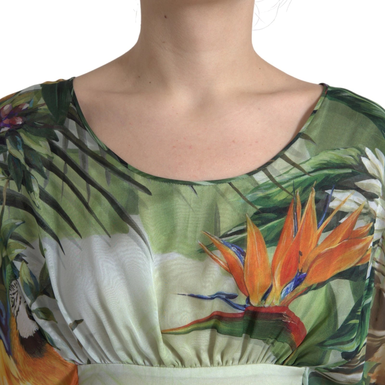 Elevate your wardrobe with the Dolce & Gabbana Multicolor Silk Jungle Print Maxi Dress, a stunning blend of Italian craftsmanship and wild elegance, perfect for any upscale occasion.