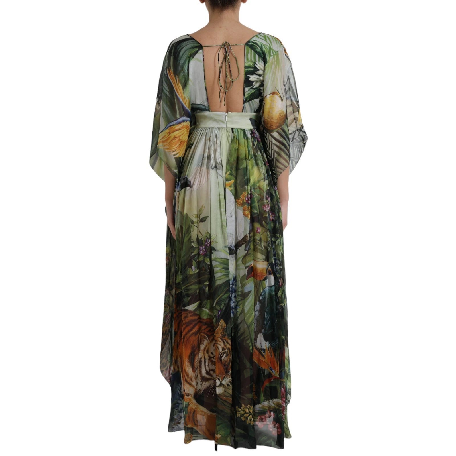 Elevate your wardrobe with the Dolce & Gabbana Multicolor Silk Jungle Print Maxi Dress, a masterpiece of Italian craftsmanship that embodies wild sophistication and luxurious allure.
