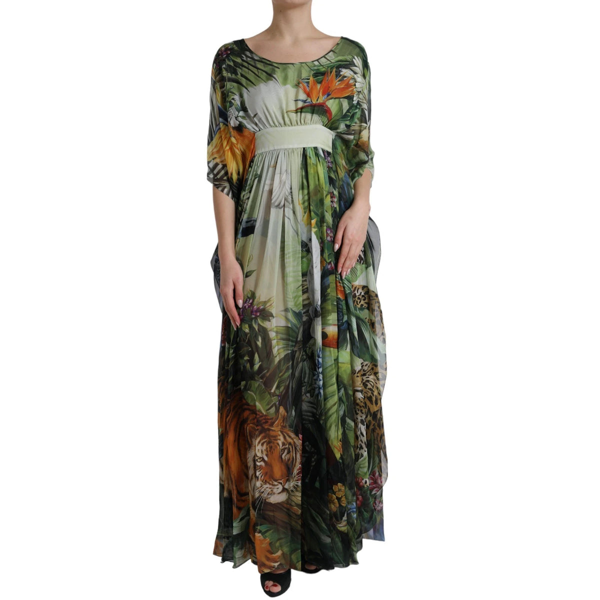 Elevate your wardrobe with the Dolce & Gabbana Multicolor Silk Jungle Print Maxi Dress, a masterpiece of Italian luxury that embodies wild sophistication and effortless elegance.