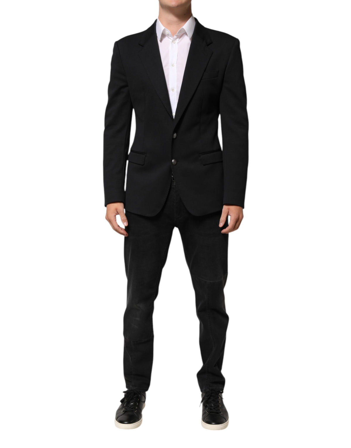 Elevate your style with the Dolce & Gabbana Dark Blue Cotton Blazer, a masterpiece of exquisite craftsmanship, perfect for the discerning individual who embodies sophistication.