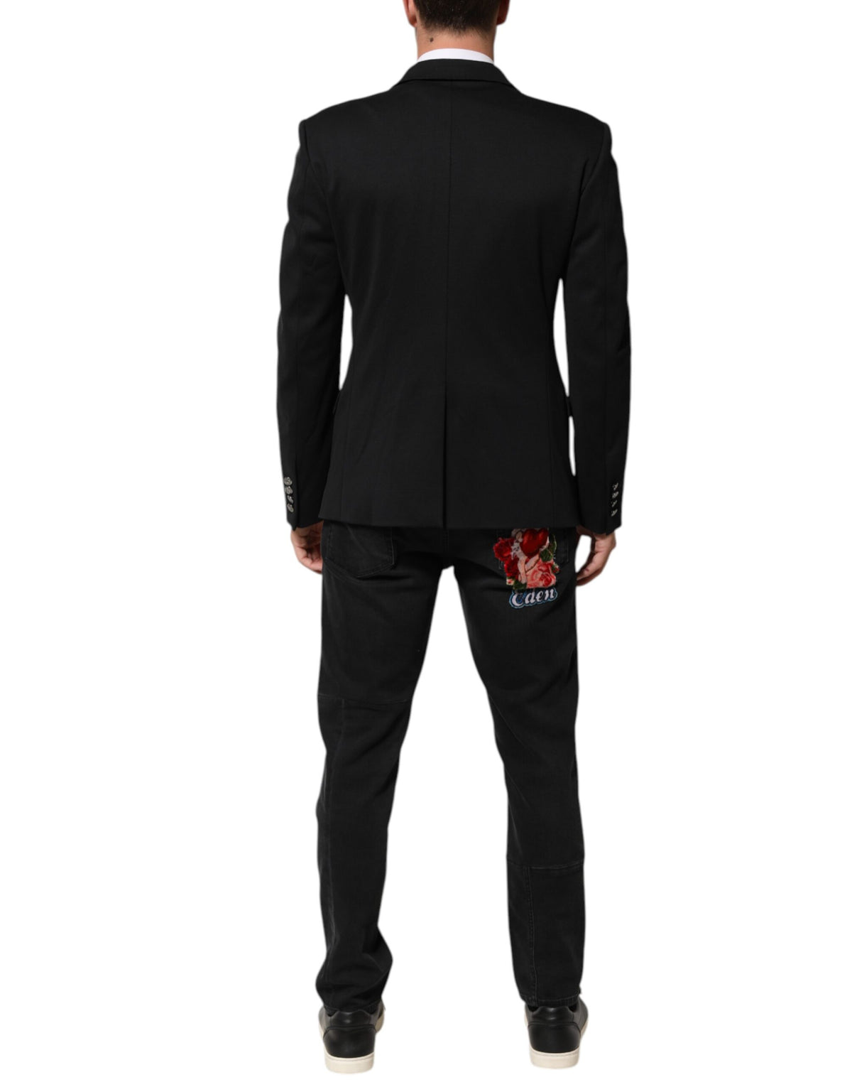 Elevate your wardrobe with the exquisite Dolce & Gabbana Dark Blue Cotton Blazer, a timeless masterpiece crafted for those who embody sophistication and luxury.