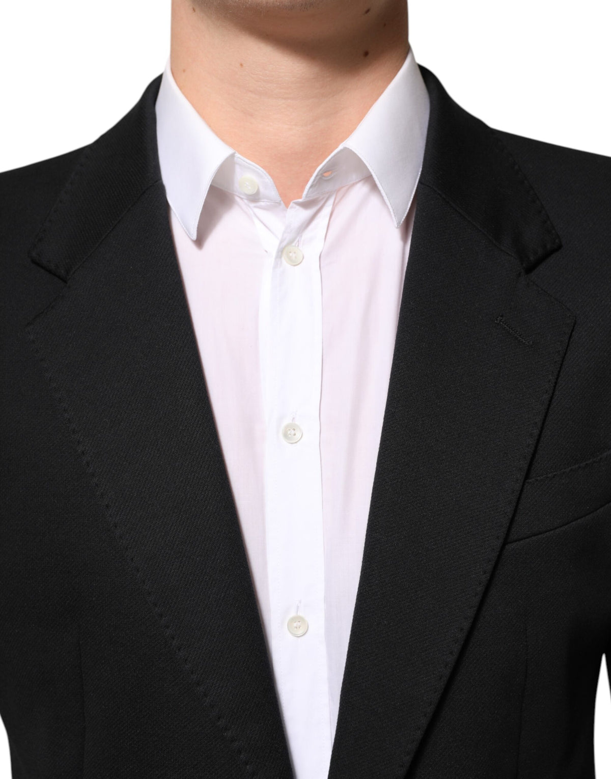 Elevate your wardrobe with the Dolce & Gabbana Dark Blue Cotton Blazer, a timeless piece of exquisite craftsmanship, perfect for the discerning individual who embodies luxury and sophistication.