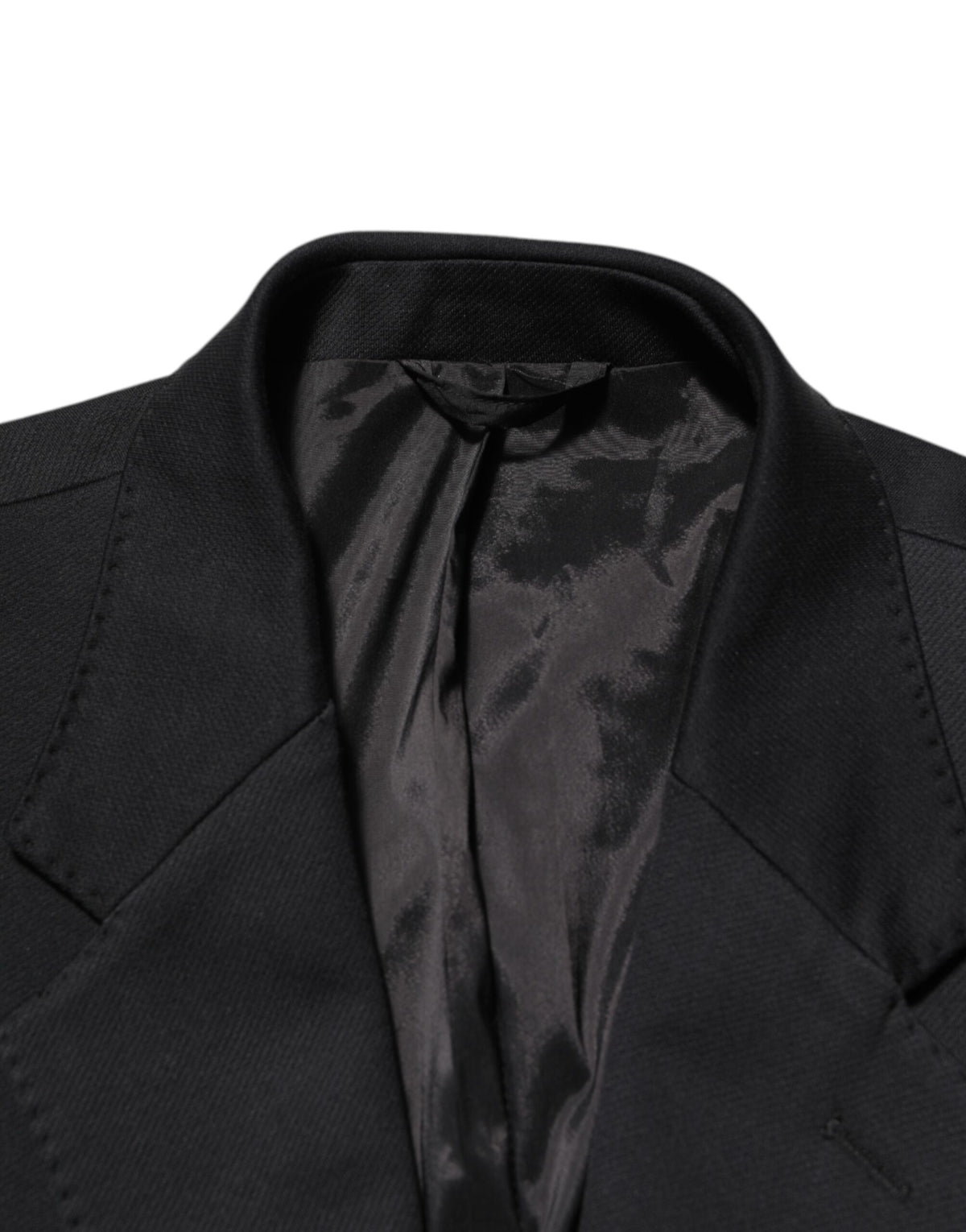 Elevate your style with the Dolce & Gabbana Dark Blue Cotton Blazer, a masterpiece of exquisite craftsmanship and luxurious materials, perfect for the discerning individual.
