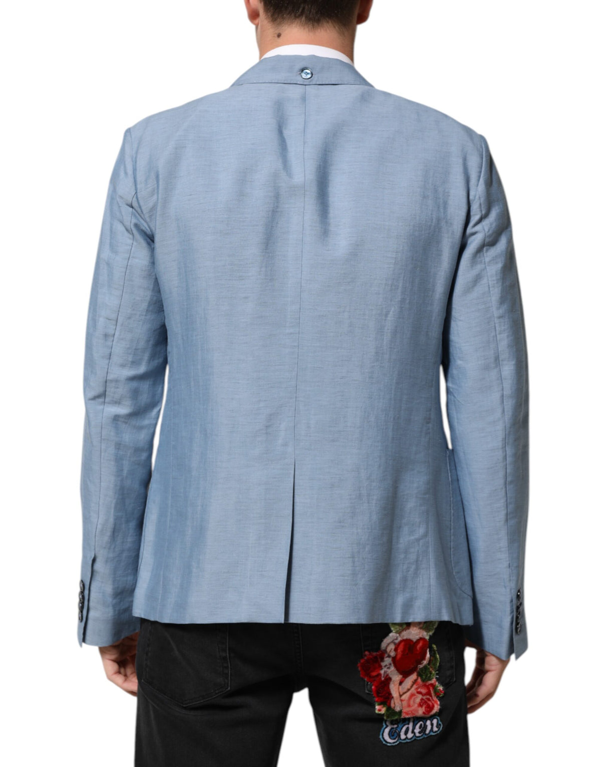 Elevate your style with the Dolce & Gabbana Light Blue Linen Double Breasted Men Jacket Blazer, a masterpiece of Italian craftsmanship that embodies luxury and sophistication.