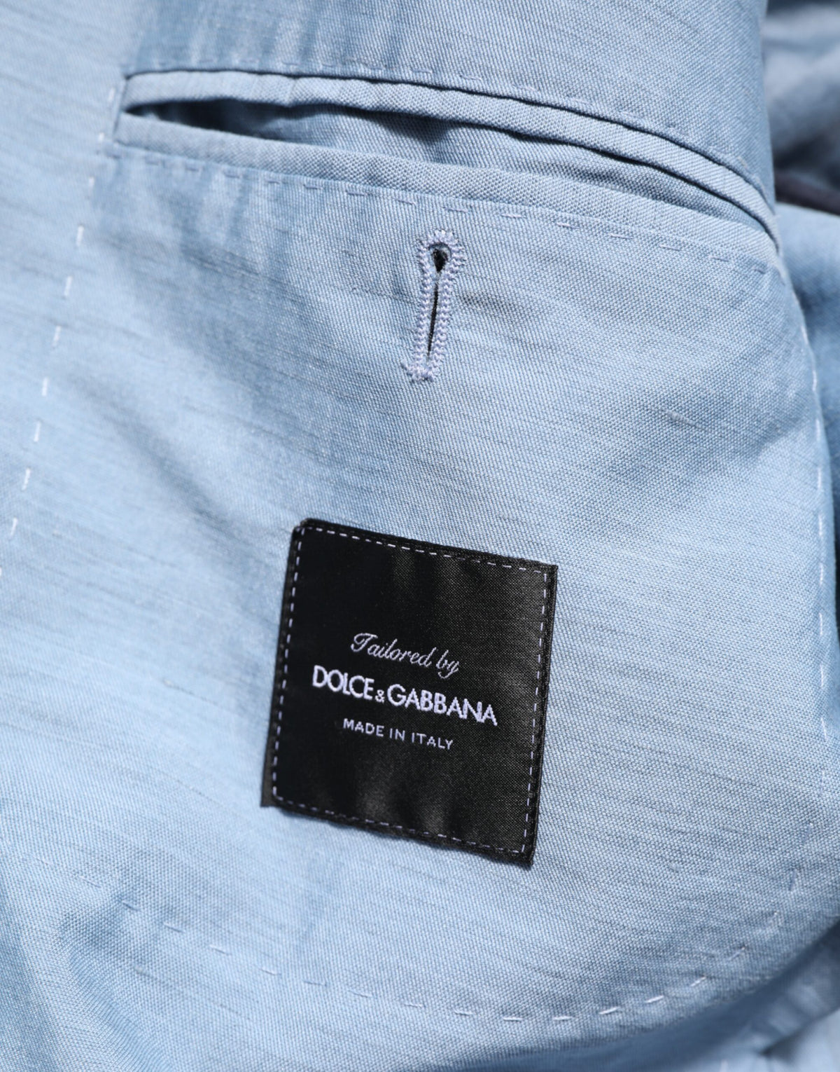 Elevate your style with the Dolce & Gabbana Light Blue Linen Double Breasted Men Jacket Blazer, a testament to Italian craftsmanship and timeless elegance.