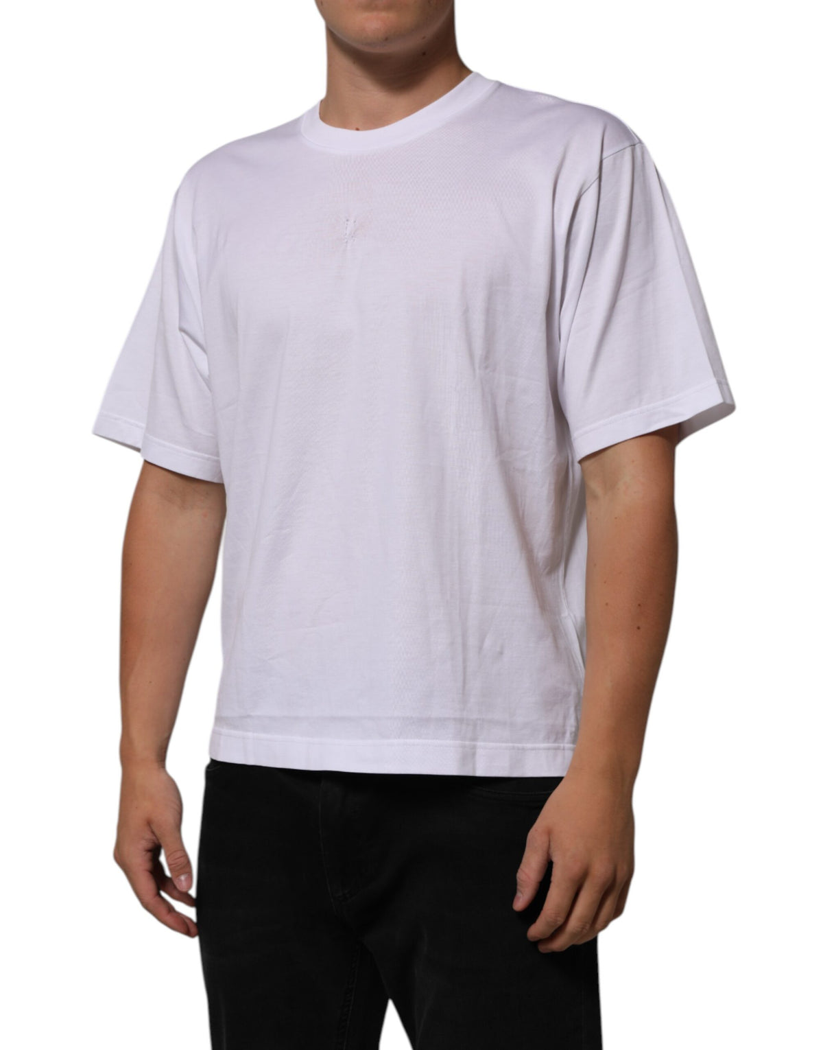 Elevate your wardrobe with the Dolce & Gabbana White Cotton Logo Patch Crew Neck T-shirt, a timeless luxury piece crafted in Italy, blending elegance and comfort effortlessly.