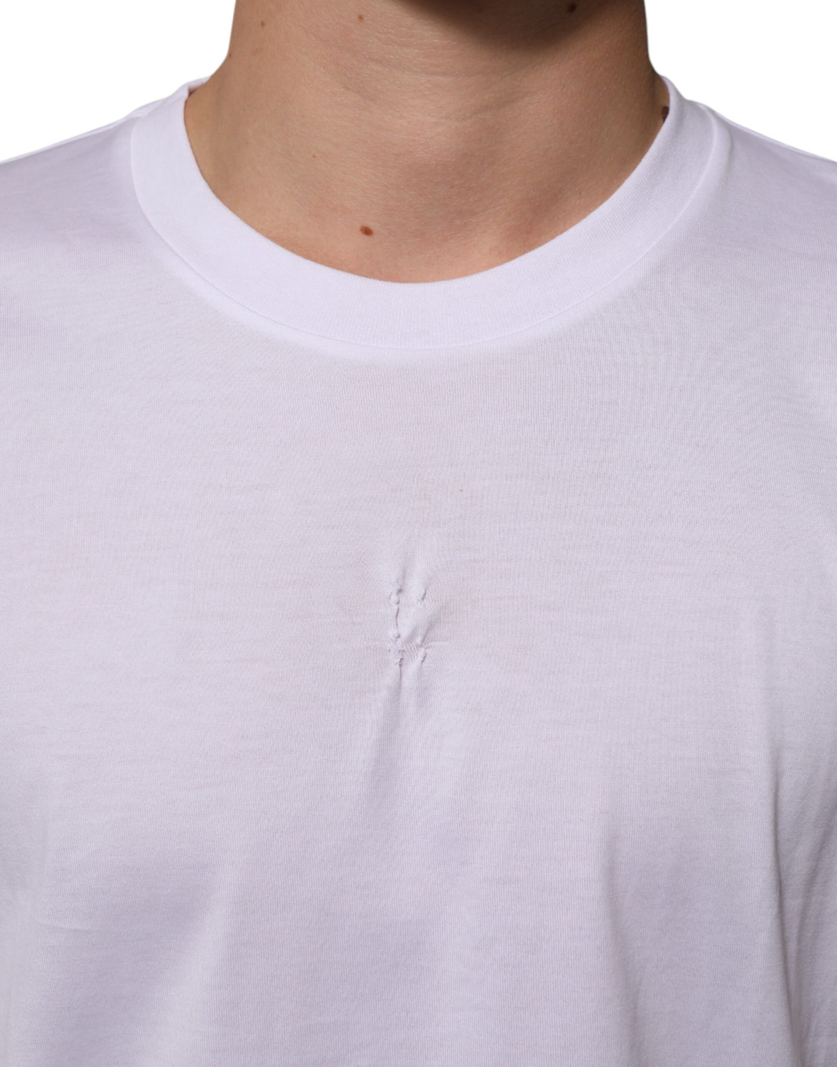 Indulge in the elegance of Dolce & Gabbana's White Cotton Logo Patch Crew Neck T-shirt, a timeless luxury crafted in Italy, embodying sophistication and effortless style.