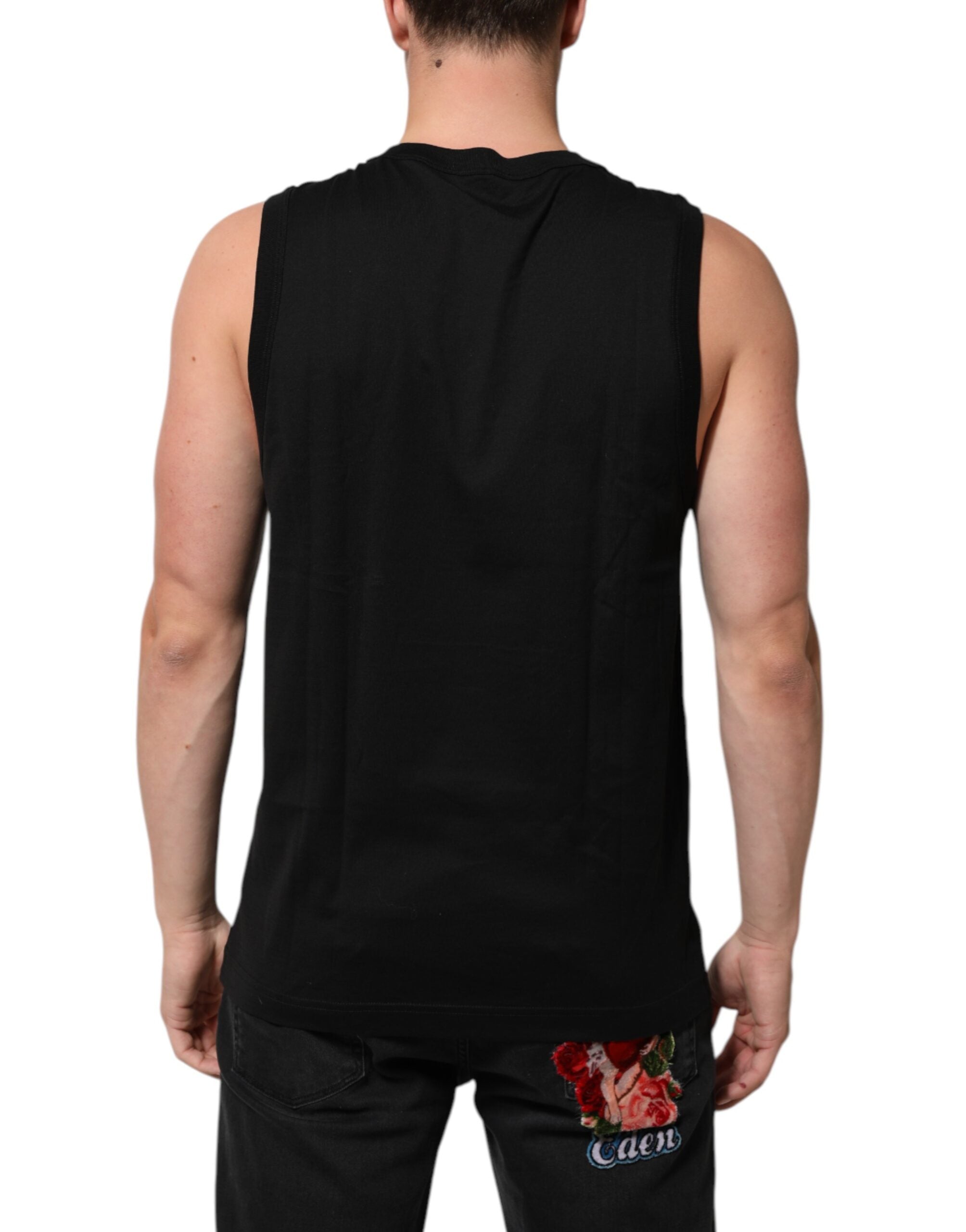 Indulge in the luxurious elegance of the Dolce & Gabbana Black Cotton Sleeveless Tank Top, crafted from premium cotton, embodying Italian sophistication for discerning individuals.