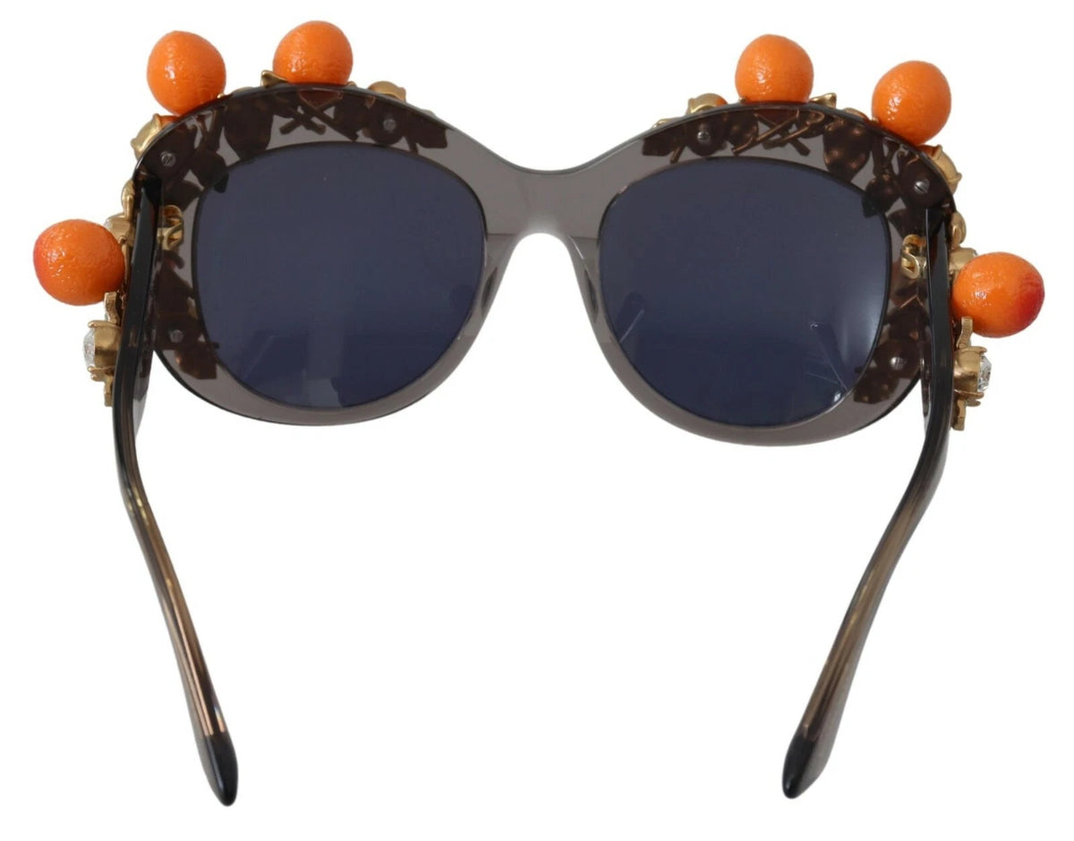 Elevate your style with Dolce & Gabbana DG4283B sunglasses, featuring exquisite acetate and intricate orange appliques, embodying luxury and sophistication.