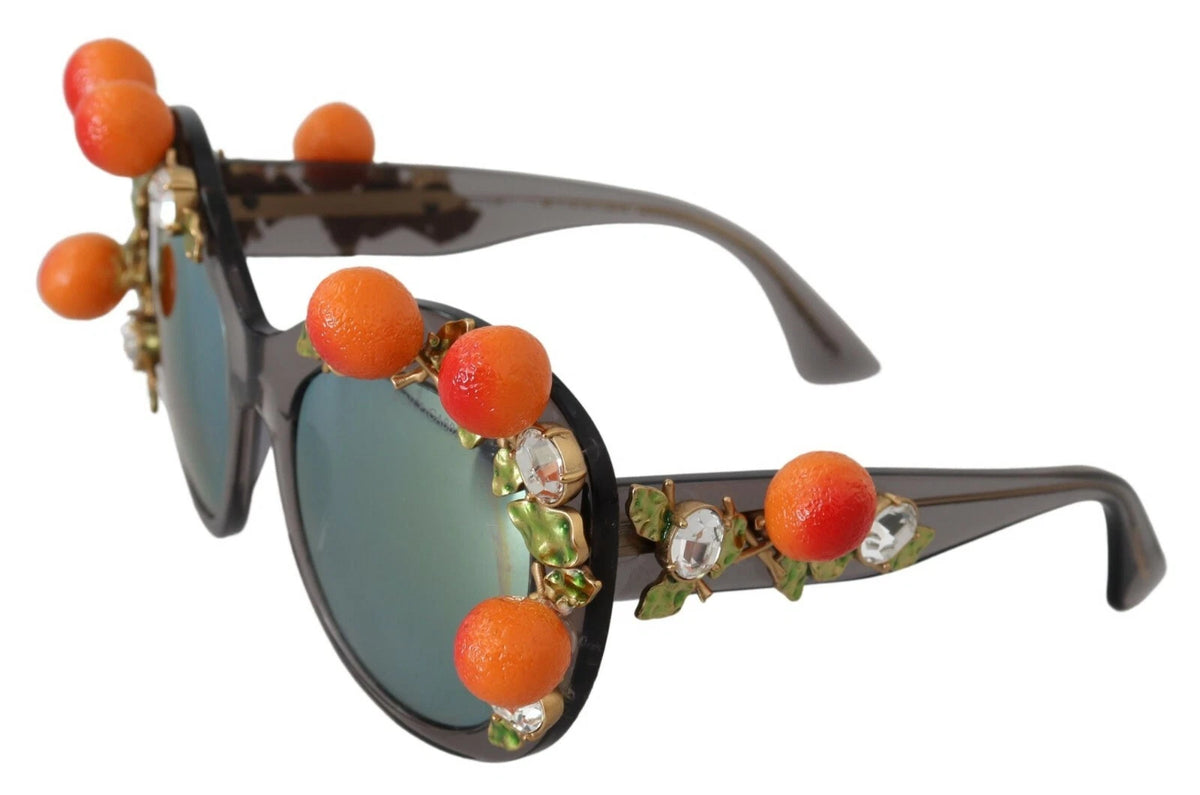 Indulge in the exquisite craftsmanship of Dolce & Gabbana DG4283B sunglasses, where luxurious acetate meets intricate orange appliques for a statement of timeless elegance.
