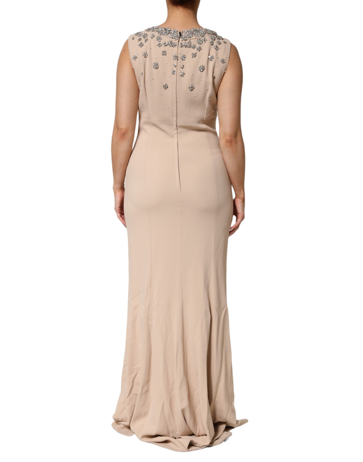 Elevate your elegance with the Dolce & Gabbana Nude Ecru Beaded Crystal Embellished Dress, a masterpiece of Italian craftsmanship that embodies opulence and allure.