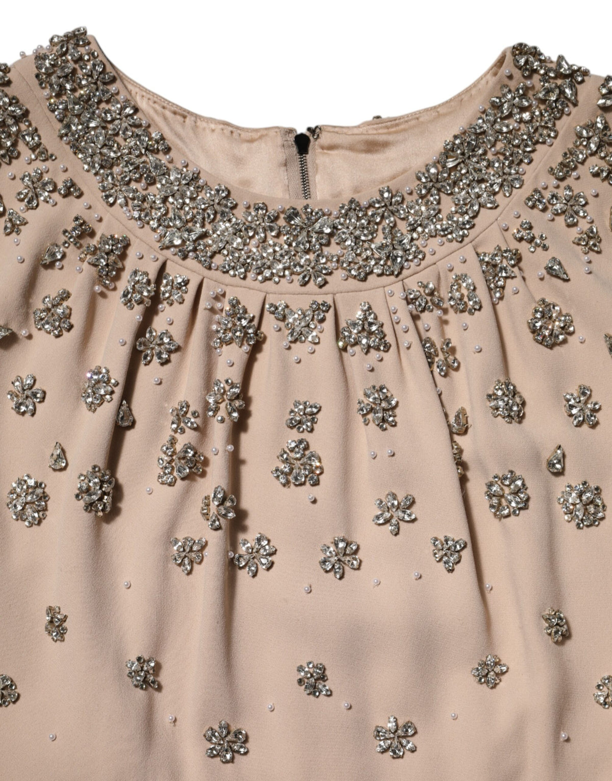 Discover the exquisite Dolce & Gabbana Nude Ecru Beaded Crystal Embellished Dress, a masterpiece of haute couture crafted in Italy, perfect for unforgettable moments.
